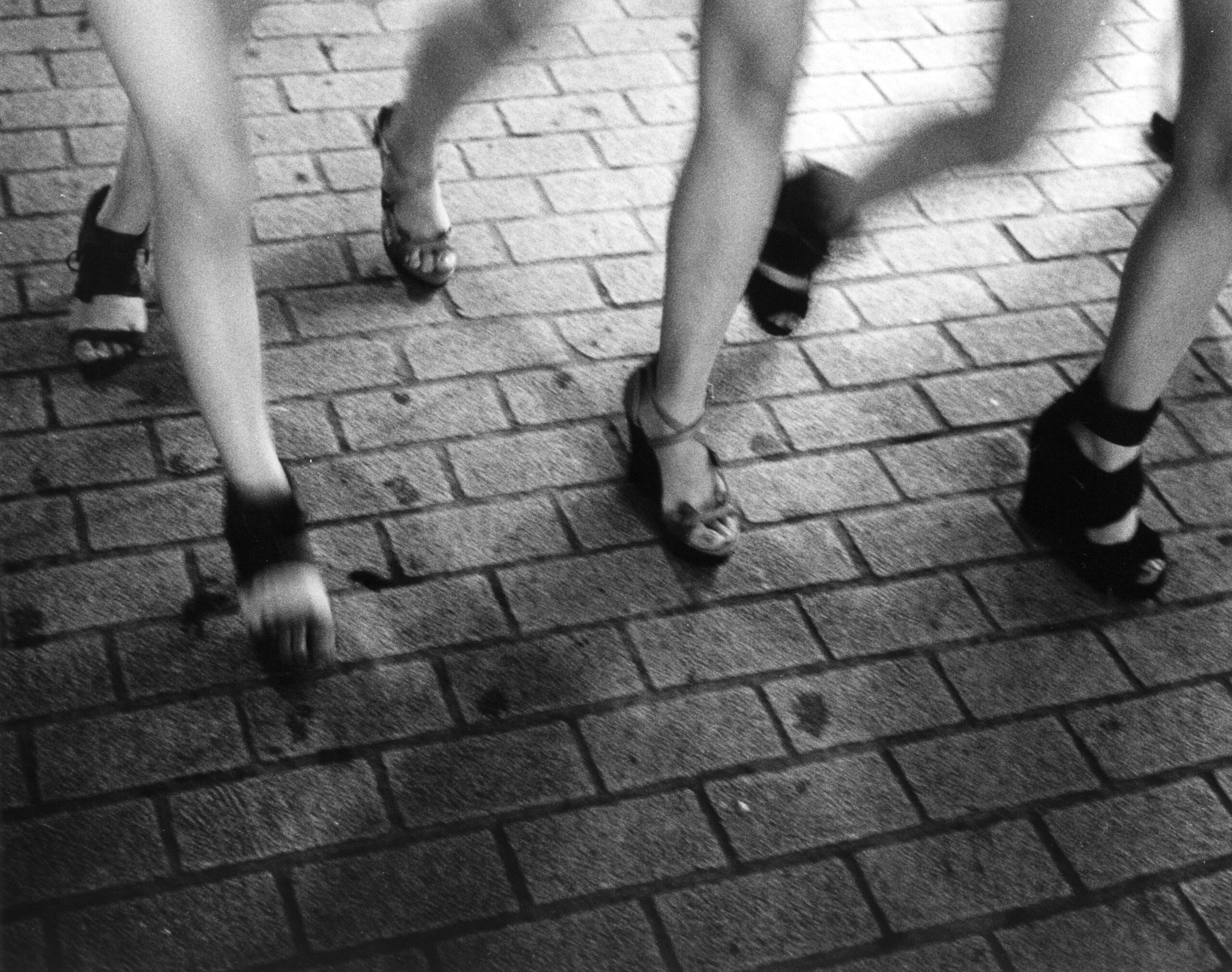 B&W photography by Thomas Beswick, Filmmaker based in Tokyo. Tokyo to Osaka Series 'Shibuya legs'