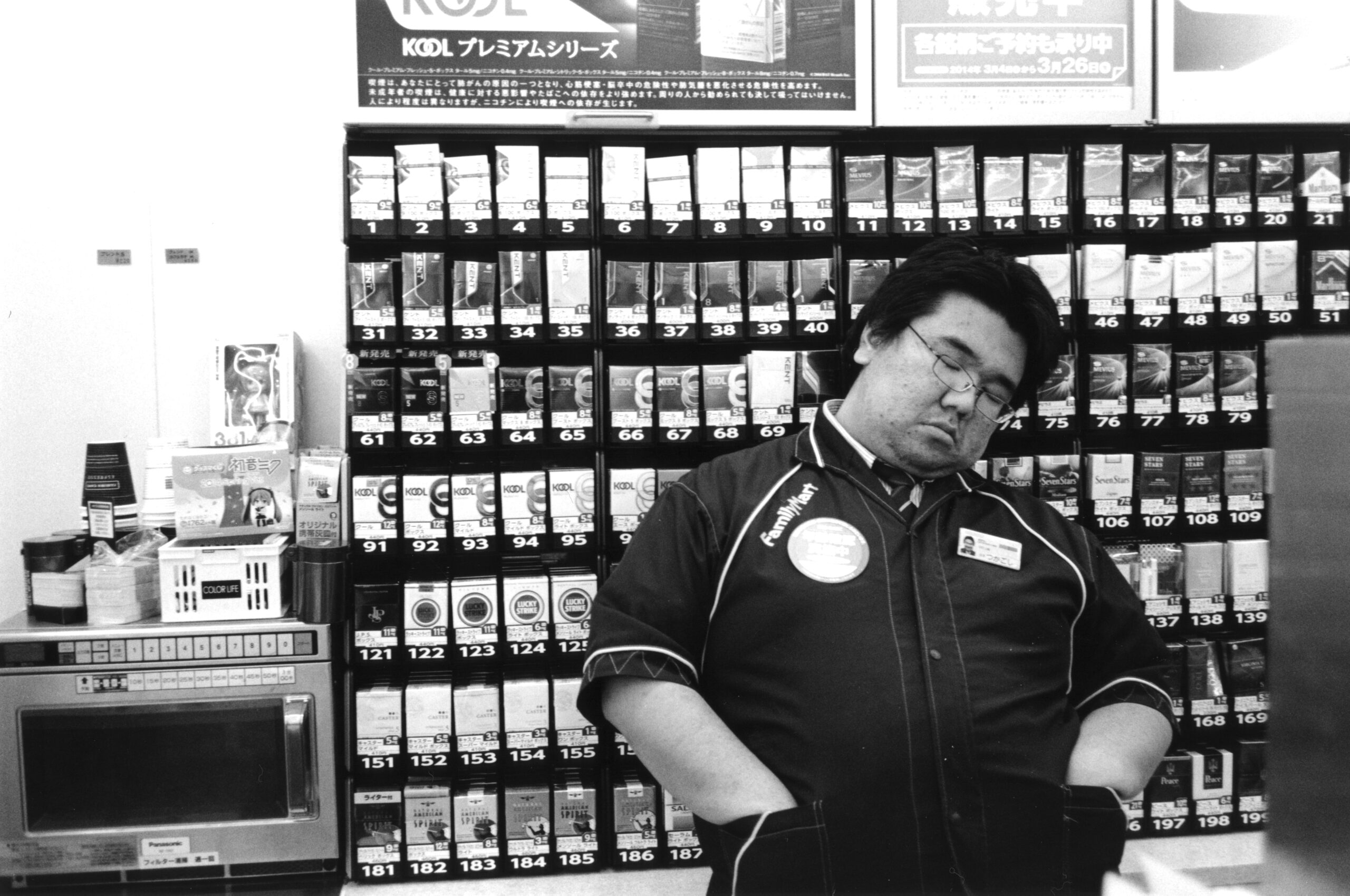 B&W photography by Thomas Beswick, Filmmaker based in Tokyo. Tokyo Diary Series 'Family Mart night shift'