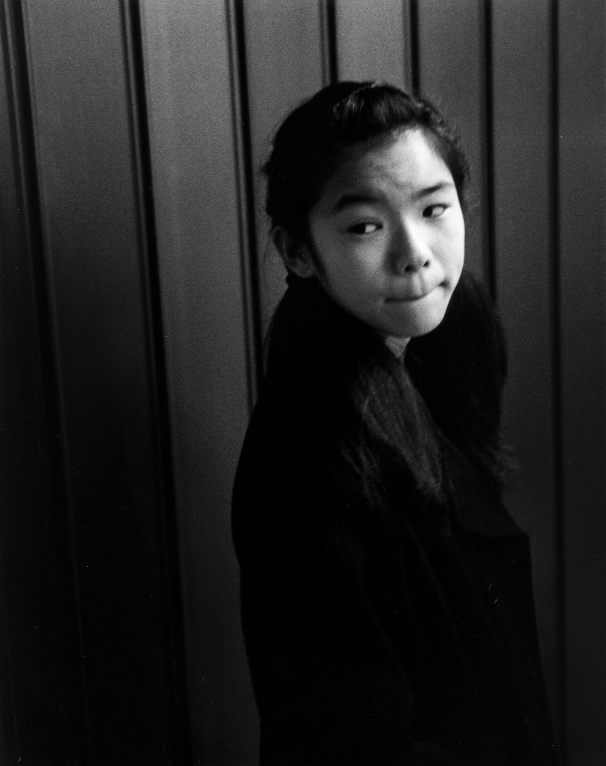 B&W photography by Thomas Beswick, Filmmaker based in Tokyo. Tokyo to Osaka Series 'subway school girl'